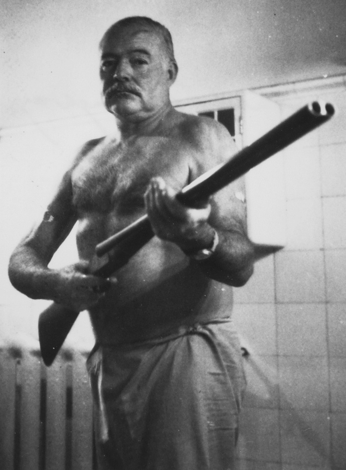 Ernest_Hemingway_at_the_Finca_Vigia_Cuba_-_NARA_cropped